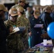 U.S. Sailors attend an education fair