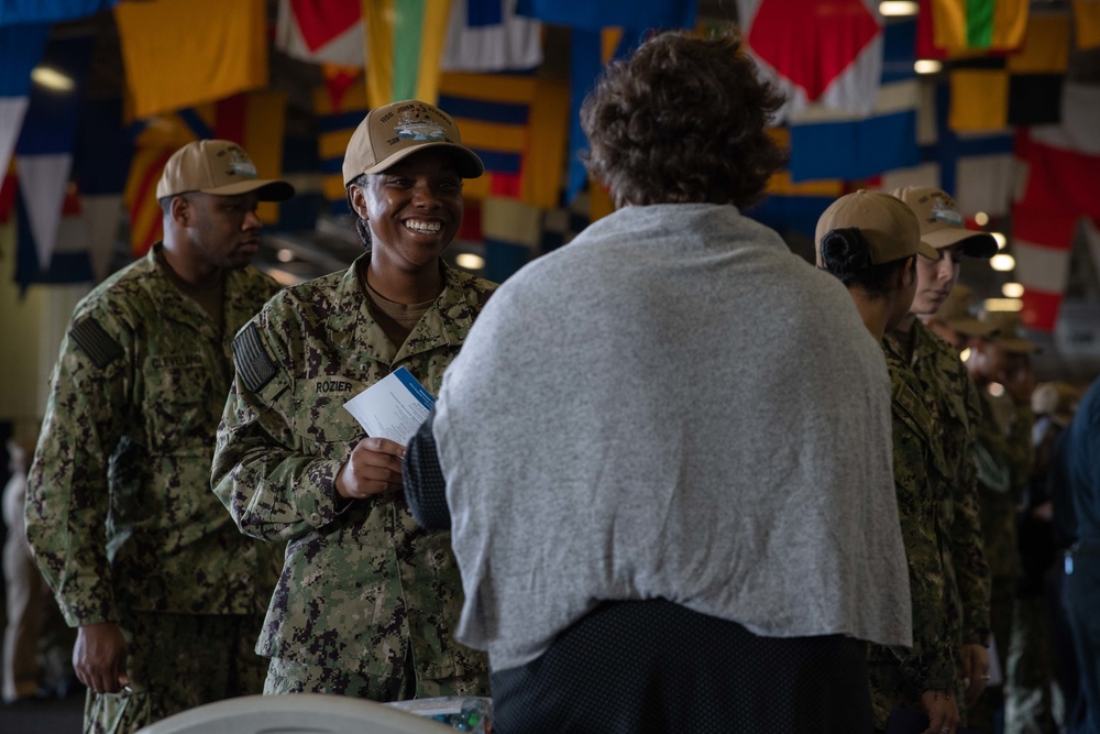 U.S. Navy Aviation Boatswain's Mate (Equipment) 3rd Class Kierra Rozier, from Atlanta, attends an education fair.