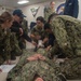 U.S. Navy Sailors practice first-aid