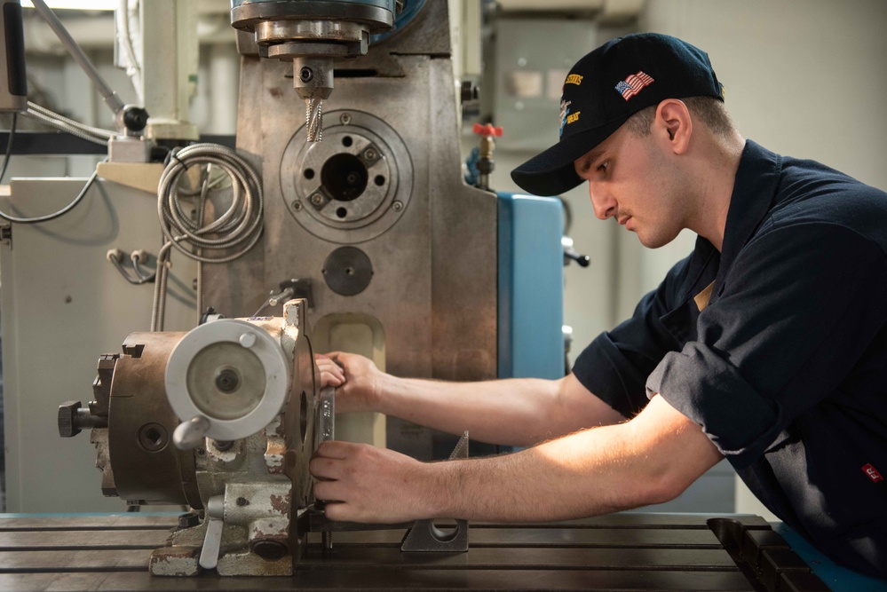 U.S. Sailor sets up the horizontal mill