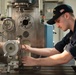 U.S. Sailor sets up the horizontal mill