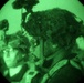 Soldiers from assigned to 1-4 Infantry prepare for night Air Assault