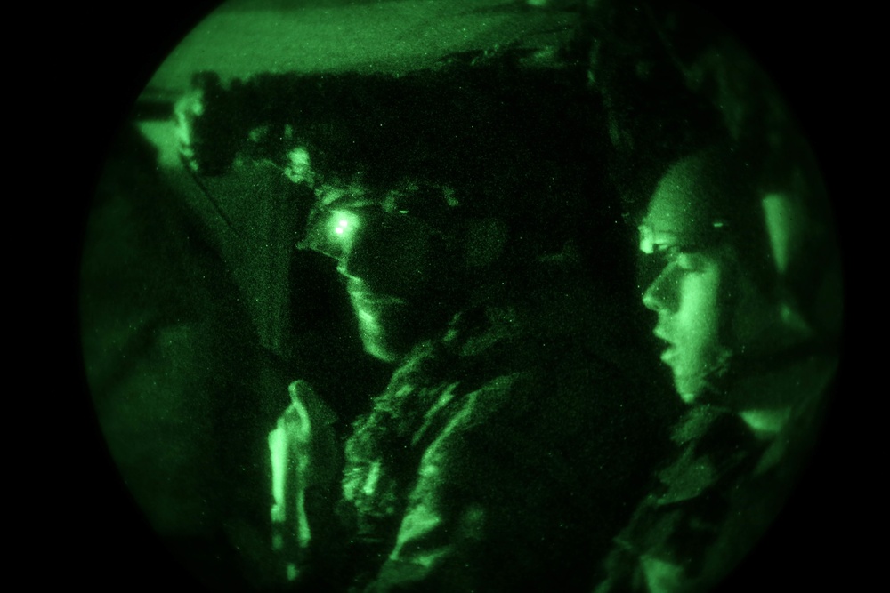 Soldiers assigned to 1-4 Infantry prepare for night Air Assault