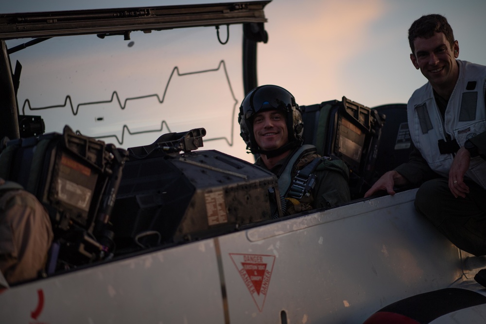 U.S. Sailor prepares for a flight