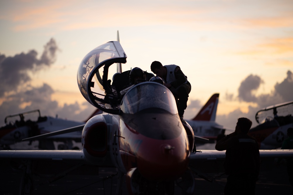 U.S. Sailors conduct preflight checks