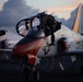 U.S. Sailor climbs into a cockpit