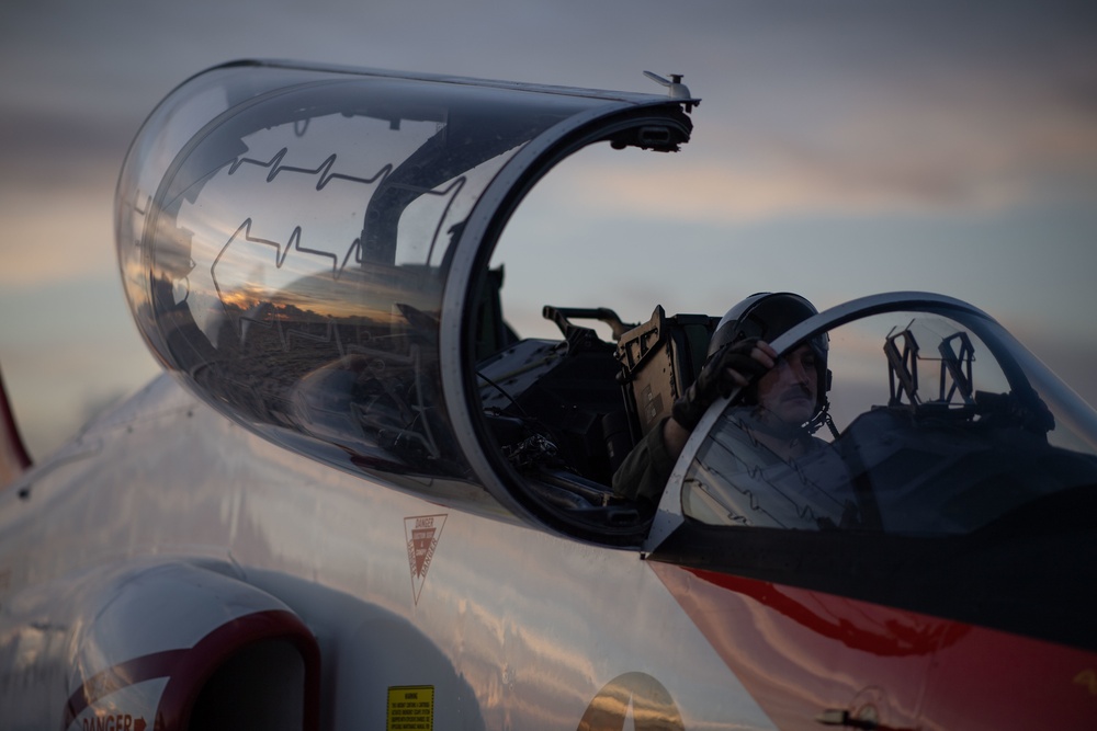 U.S. Sailor conducts preflight checks