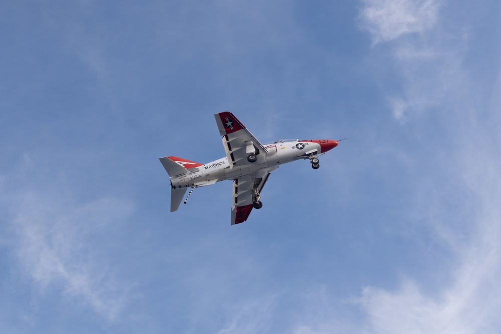 A T-45C Goshawk flies over USS John C. Stennis