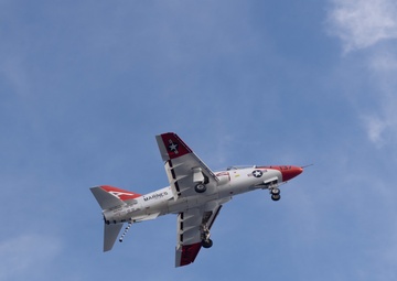 A T-45C Goshawk flies over USS John C. Stennis