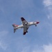 A T-45C Goshawk flies over USS John C. Stennis