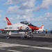 A T-45C Goshawk lands aboard USS John C. Stennis