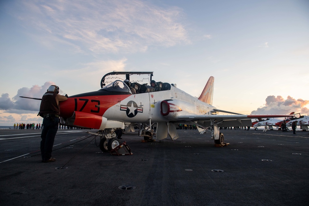 U.S. Sailors conduct preflight checks