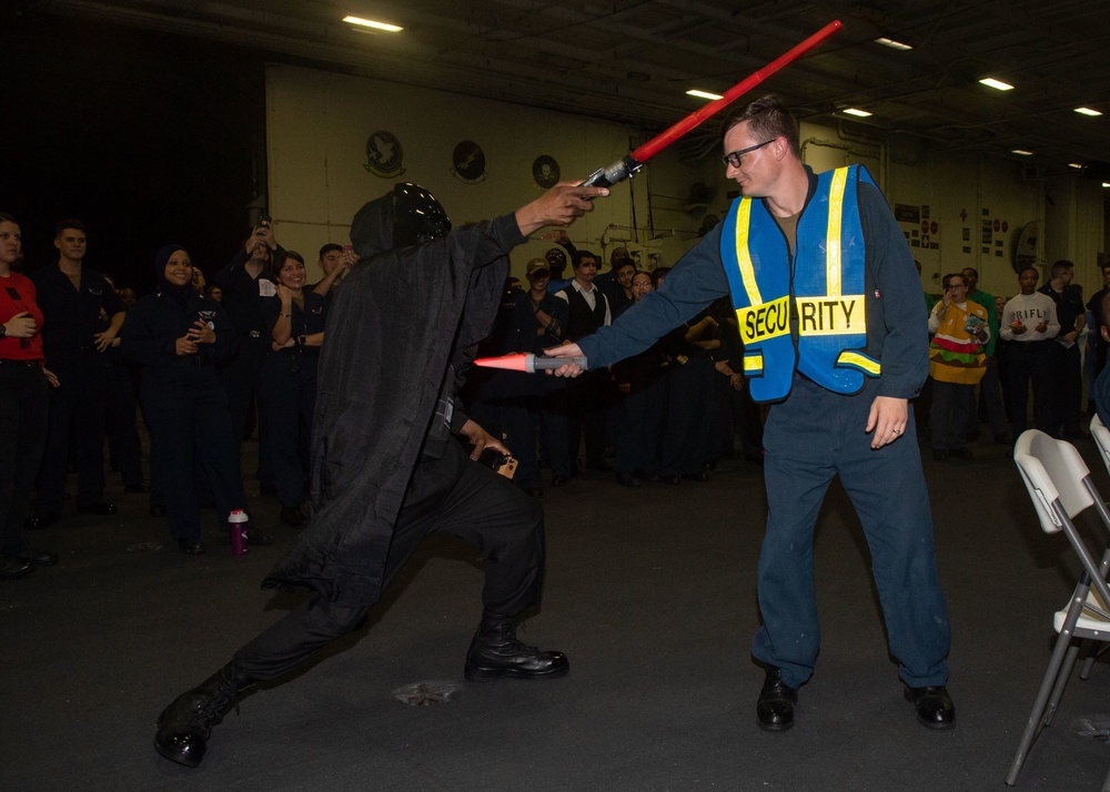 U.S. Sailors participate in a costume contest