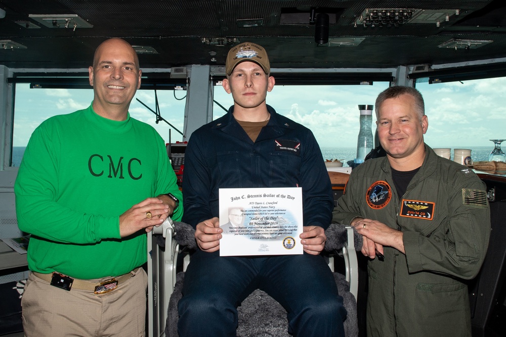 U.S. Sailors pose for a photograph