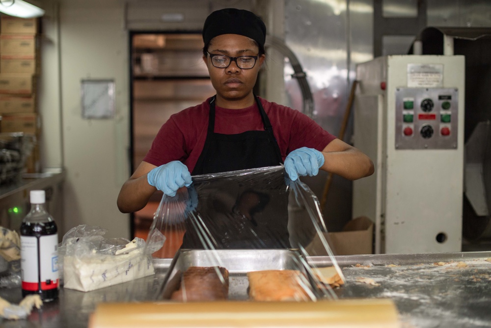 U.S. Sailor prepares bread