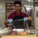 U.S. Sailor prepares bread