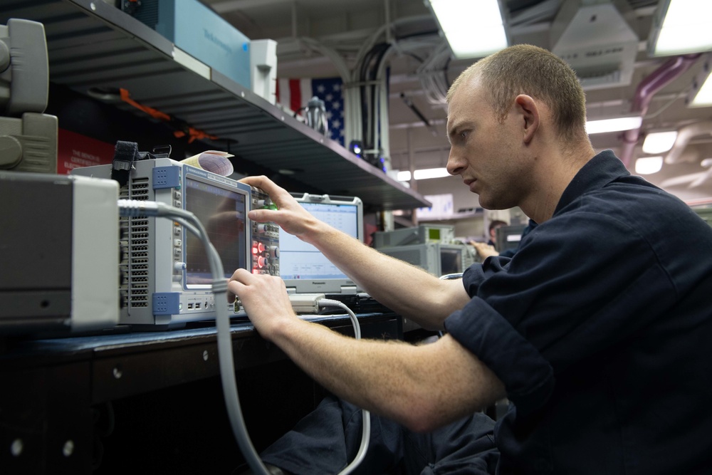 U.S. Sailor calibrates equpiment