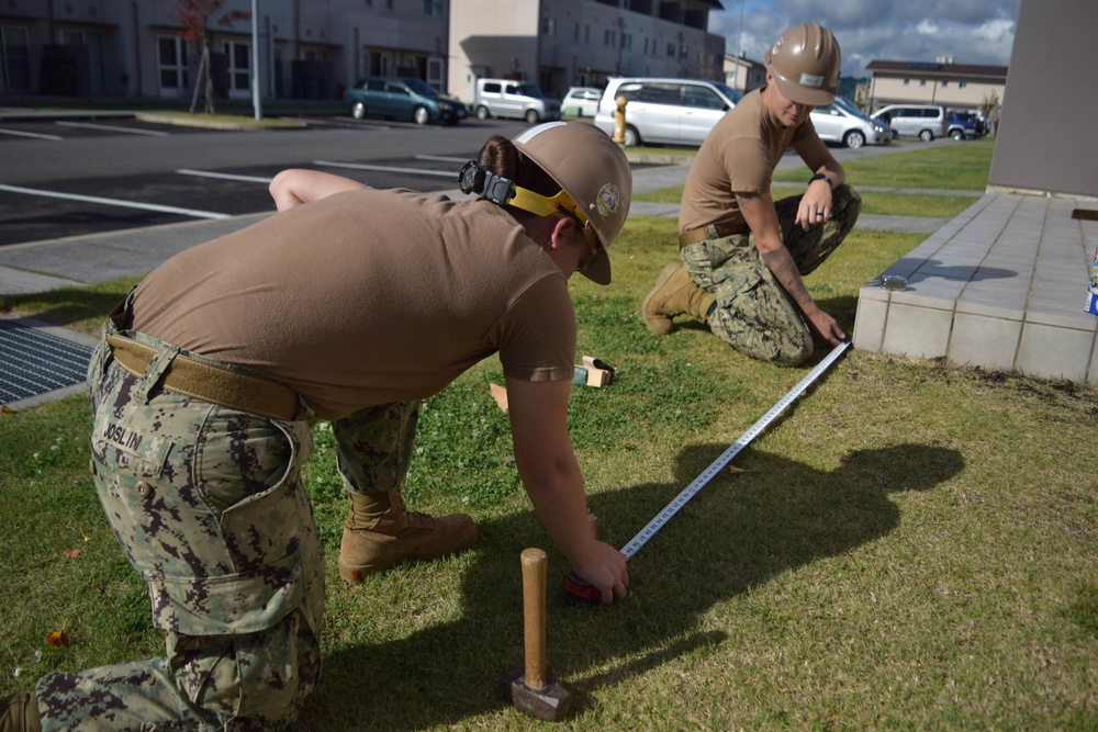 NMCB-5’s Detail Iwakuni excavates environmental trash enclosure project site