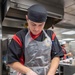 USS McCampbell Sailors prepare meals
