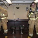 USS Normandy Sailors Don Firefighting Ensembles