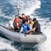USS Pioneer sails around Sasebo harbor for Family and Friends Day cruise