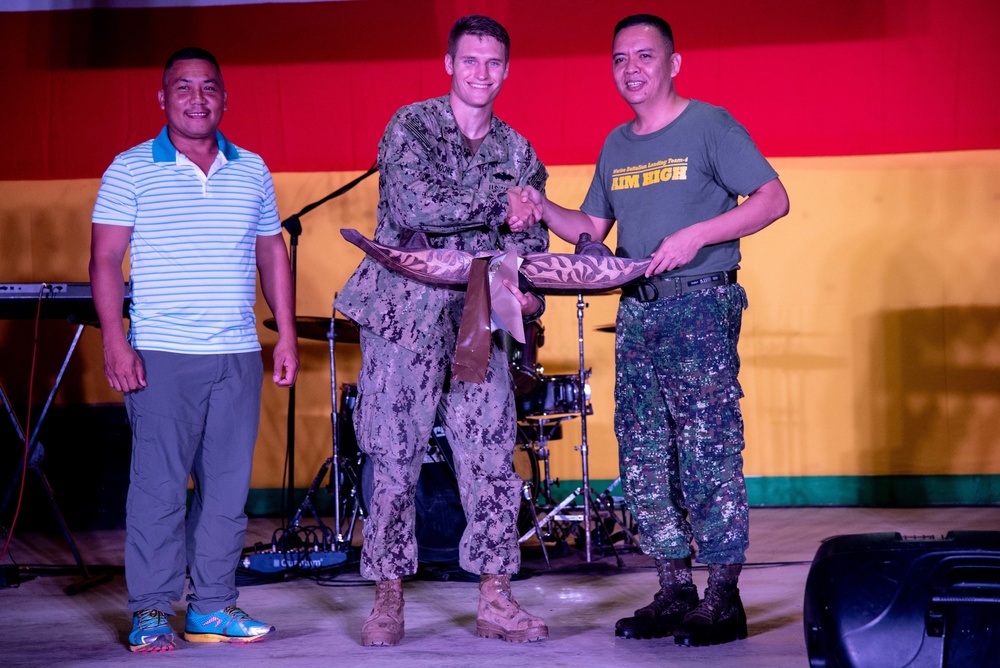 Seabees deployed with Naval Mobile Construction Battalion (NMCB) 5’s Detail Palawan participate in “Search for the Singing Warrior” with Marine Battalion Landing Team 4
