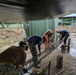Seabees deployed with Naval Mobile Construction Battalion (NMCB) 5’s Detail Palawan prepare for construction at Malatgao Elementary School
