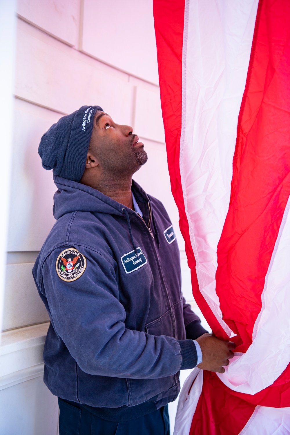 U.S. Flags are Hung in the Memorial Amphitheater in Preparation for Veterans Day