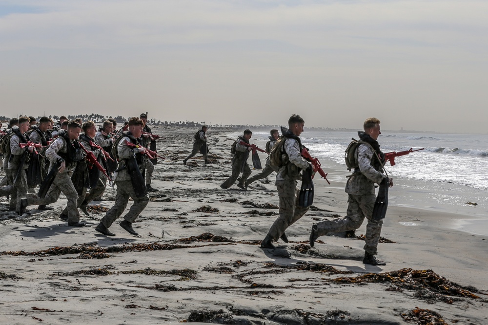 Marines from Basic Recon Course conduct helo casting, clandestine landing training