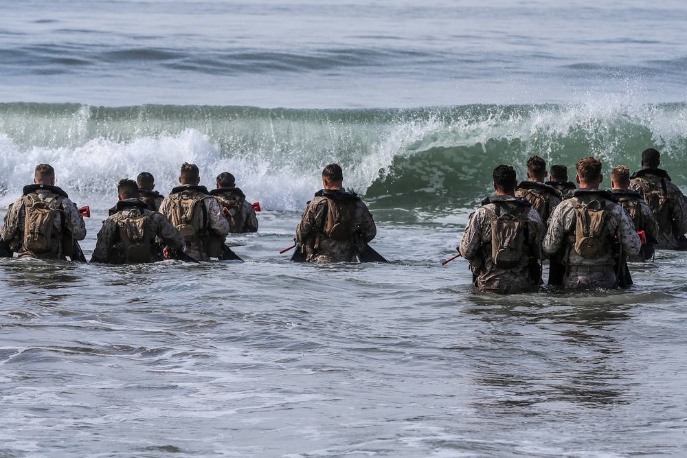 Marines from Basic Recon Course conduct helo casting, clandestine landing training