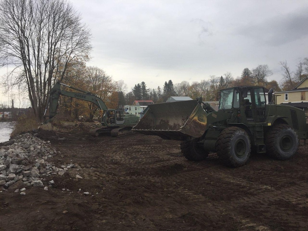 New York Army National Guard engineers repair flood control berm in Dolgeville, N.Y.