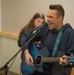 Whiteman AFB Airman sings during the inaugural resilience Kick Back Day