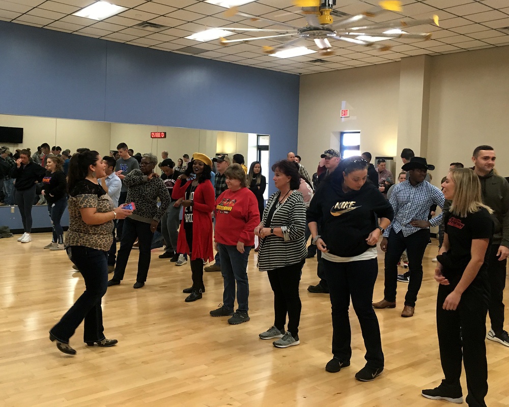 Team Whiteman learns to line dance during resilience event
