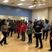 Team Whiteman learns to line dance during resilience event