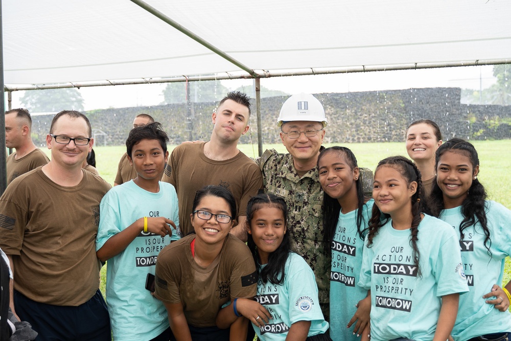 Seabees deployed with Naval Mobile Construction Battalion 5's Detail Pohnpei attend the Federated States of Micronesia Independence Day celebration