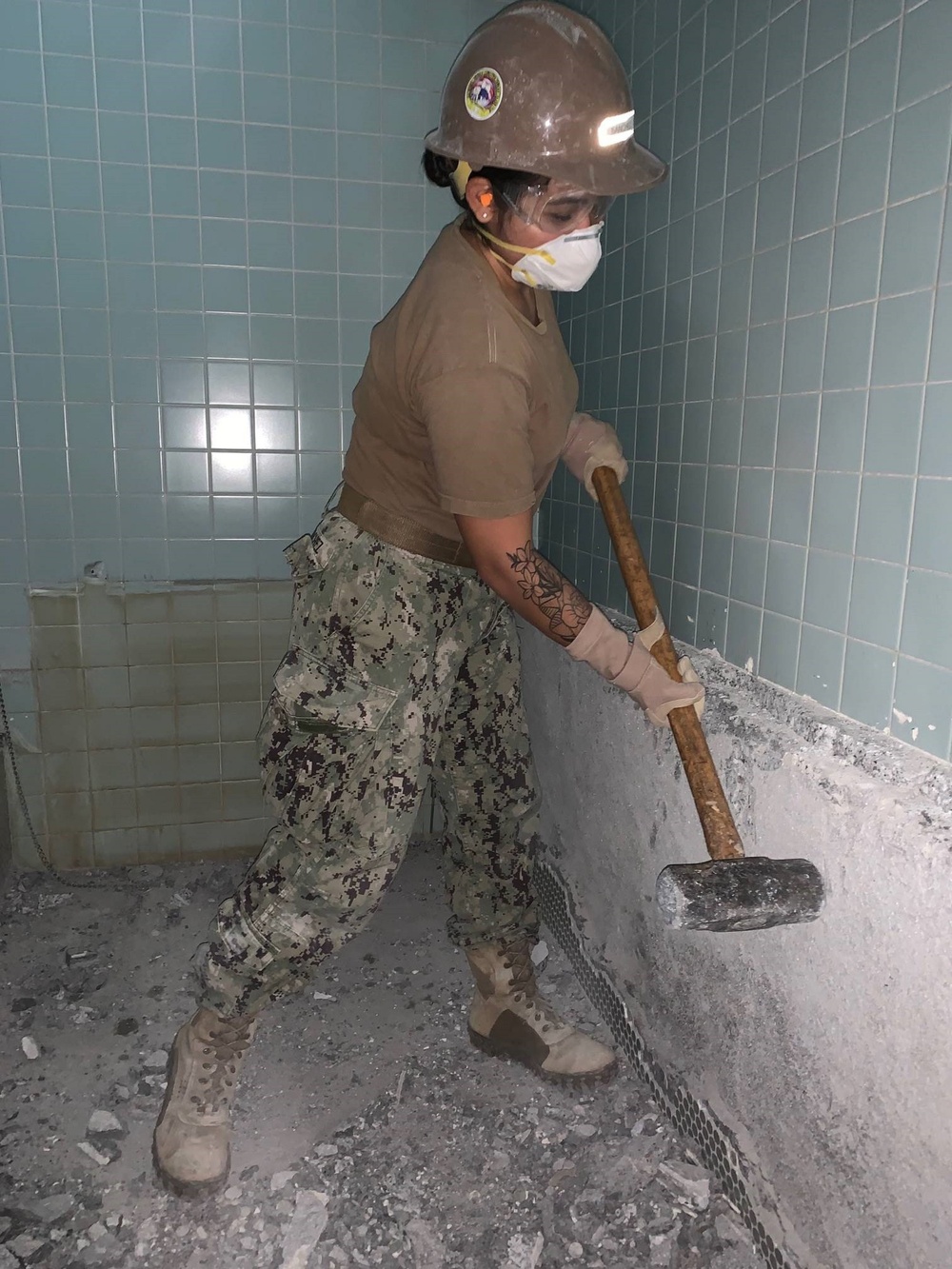 Seabees deployed with NMCB-5’s Detail Atsugi demolish a building in support of Naval Facilities Engineering Command and Naval Air Facility Atsugi