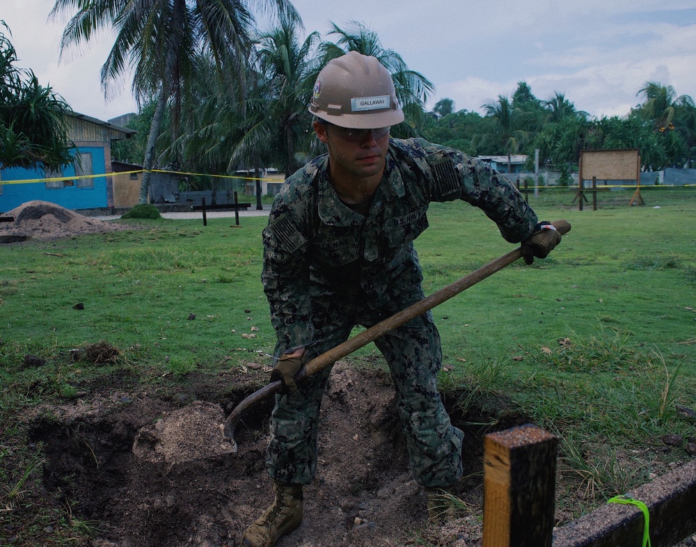 Seabees deployed with Naval Mobile Construction Battalion 5's Detail Marshall Islands start on Ennibur Evacuation Center project site