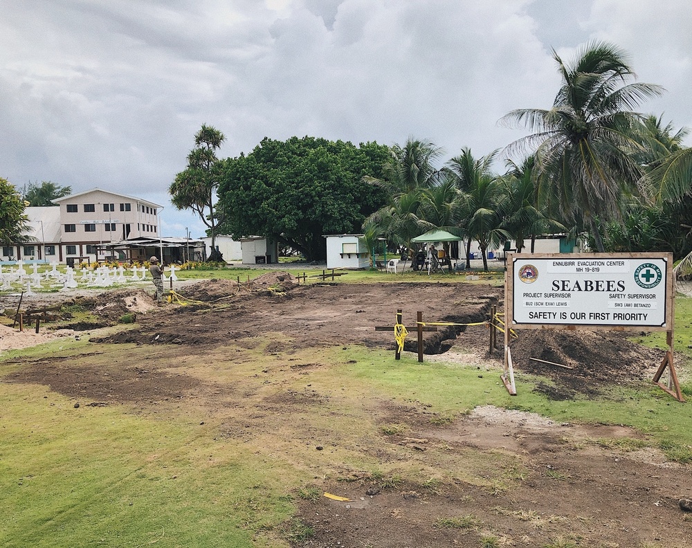 Seabees deployed with Naval Mobile Construction Battalion 5's Detail Marshall Islands start on Ennibur Evacuation Center project site