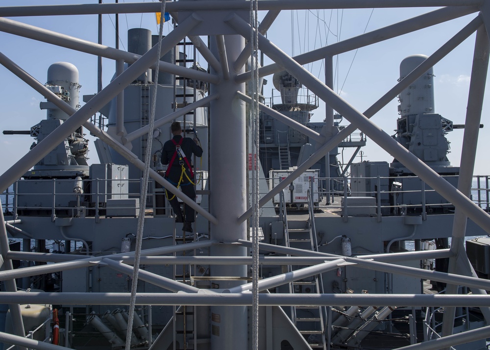 USS Normandy Sailor Climbs Main Mast