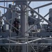 USS Normandy Sailor Climbs Main Mast