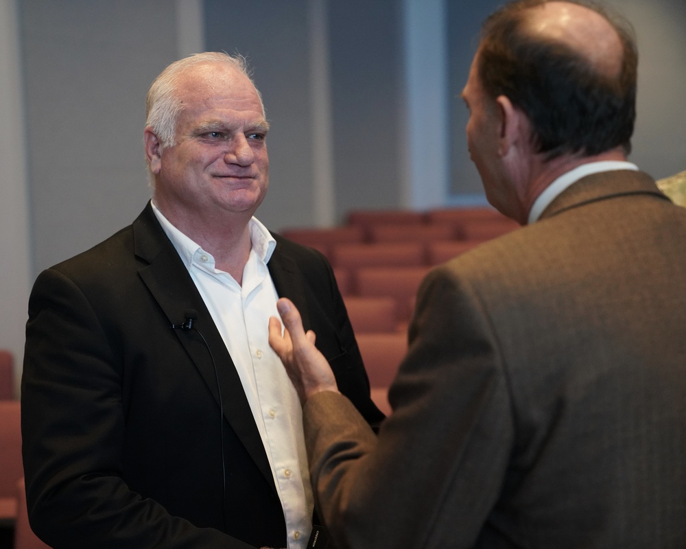 Former Pro Quarterback Eric Hipple discussed his journey from trauma to triumph during U.S. Transportation Command presentation