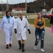 Dozens take part in 'No Treats, Just Tricks' relay race, walk at Fort McCoy