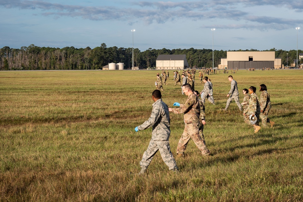 Airmen conduct post air show FOD walk