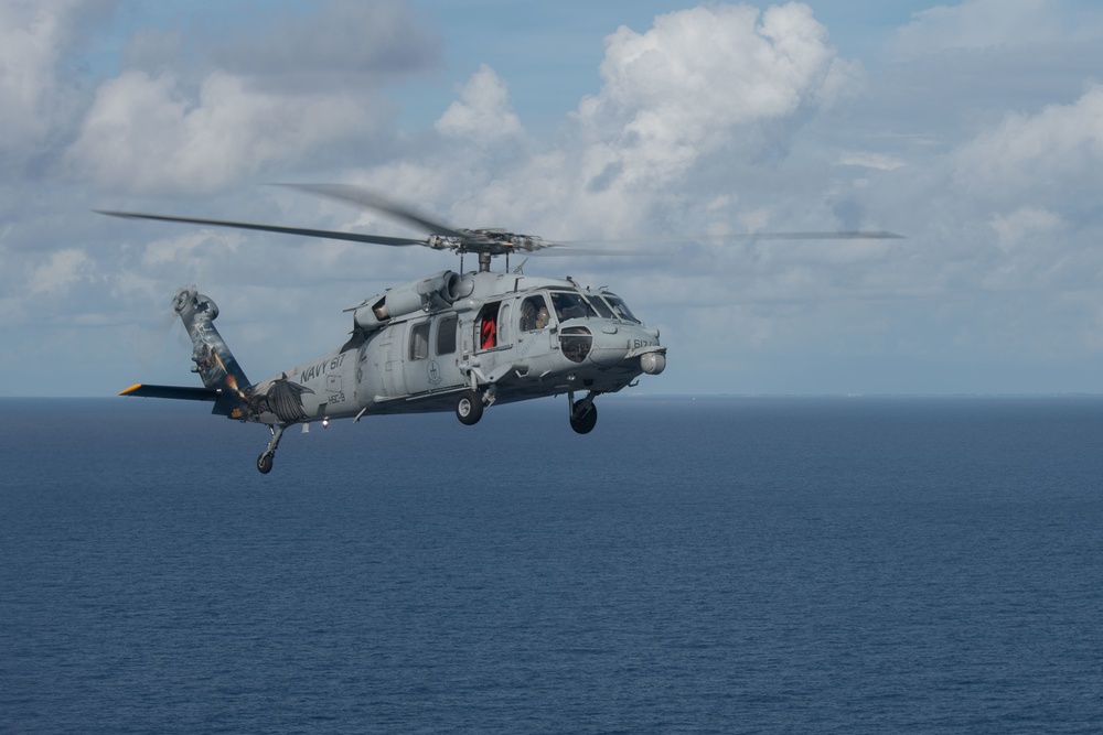 An MH-60S Sea Hawk flies over the Atlantic Ocean