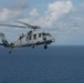 An MH-60S Sea Hawk flies over the Atlantic Ocean