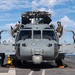 U.S. Sailors conduct preflight checks on an MH-60S Sea Hawk assigned to Helicopter Sea Combat Squadron (HSC) 6