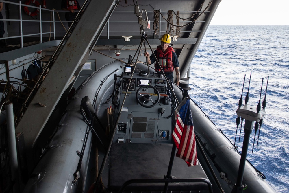 U.S. Sailor prepares for small boat operations