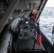 U.S. Sailor prepares for small boat operations