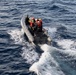 U.S. Sailors prepare operate a RHIB