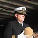 U.S. Navy Cmdr. Donald Costello participates in a burial at sea aboard the aircraft carrier USS John C. Stennis (CVN 74)